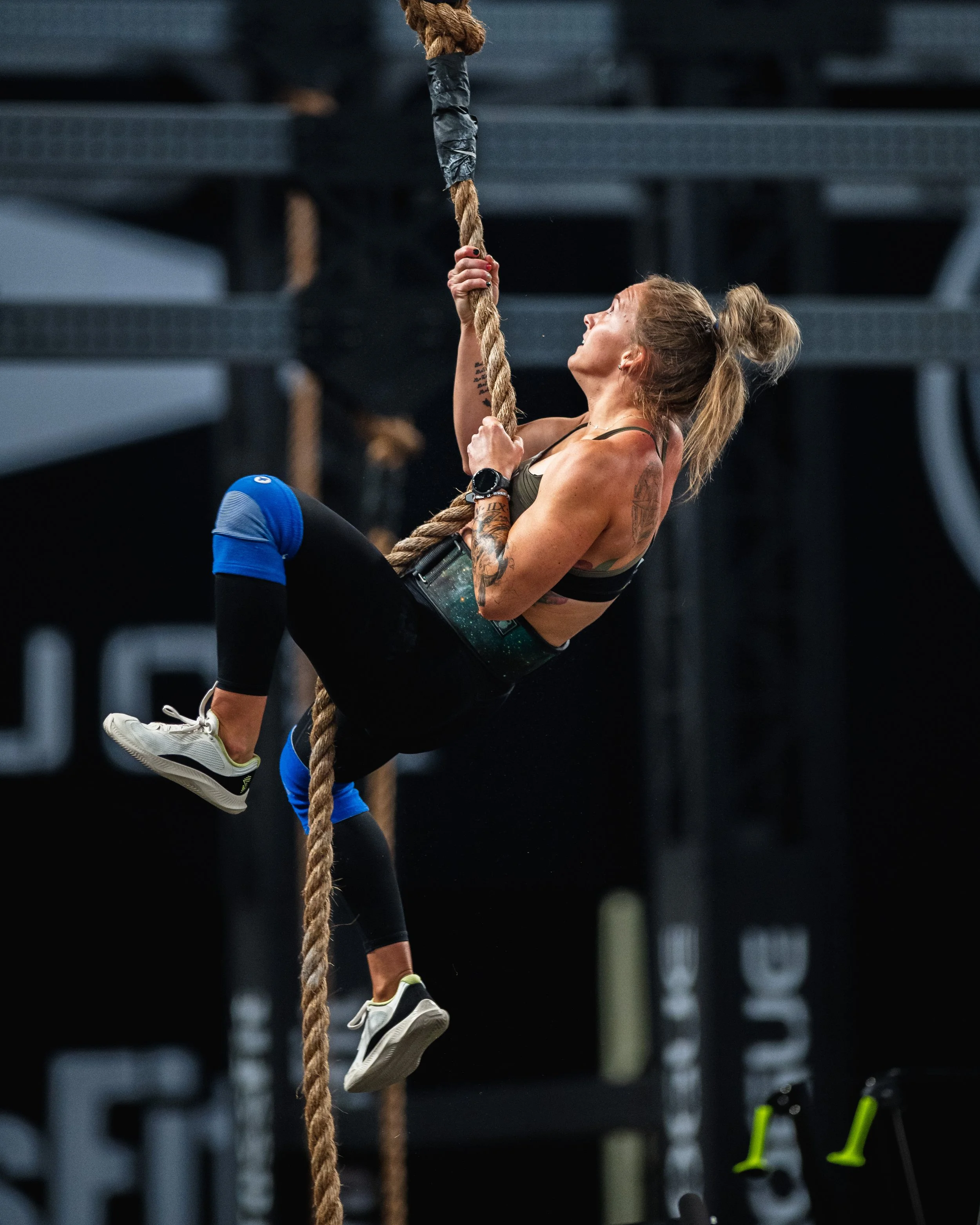 Athlete climbing a rope during a fitness competition, Einhorn Training Co. New Braunfels, TX