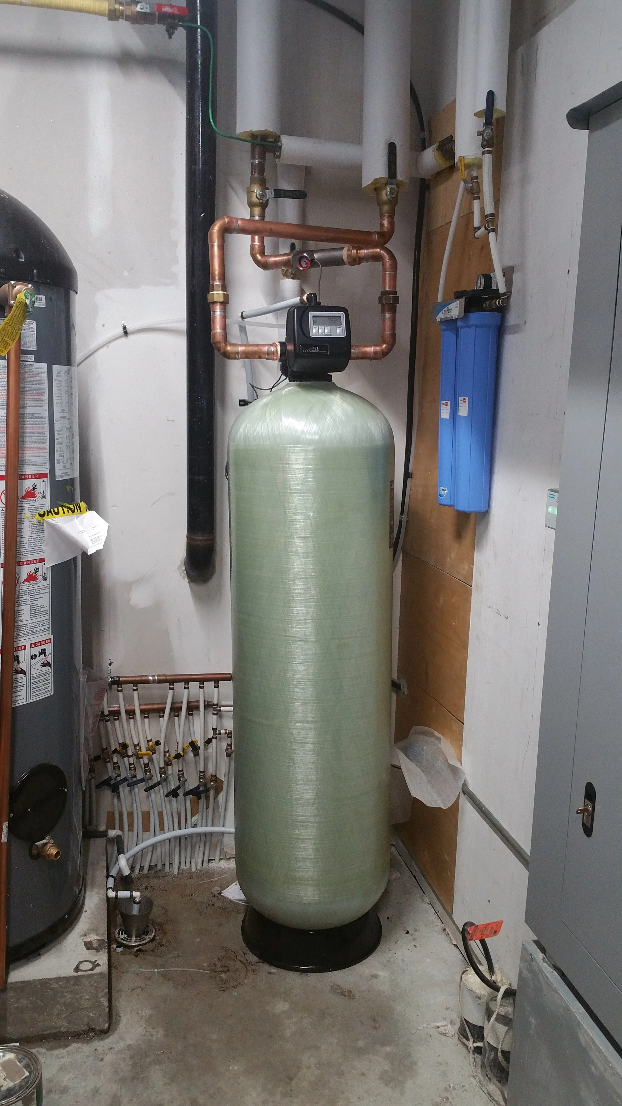 Whole-home water filtration system installed in a Springwater, Ontario home.