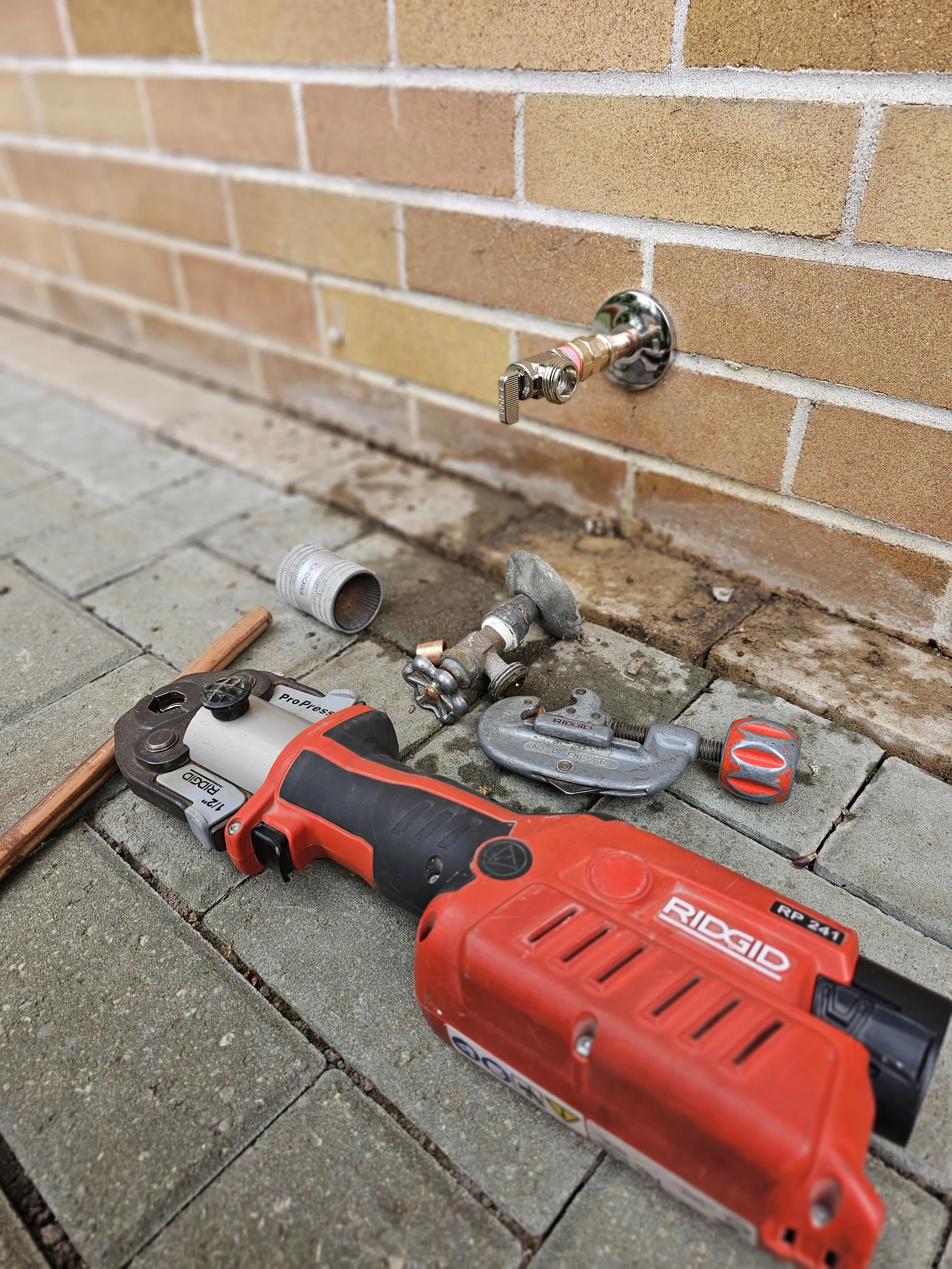 Professional plumbing tools used for residential plumbing repairs in Springwater