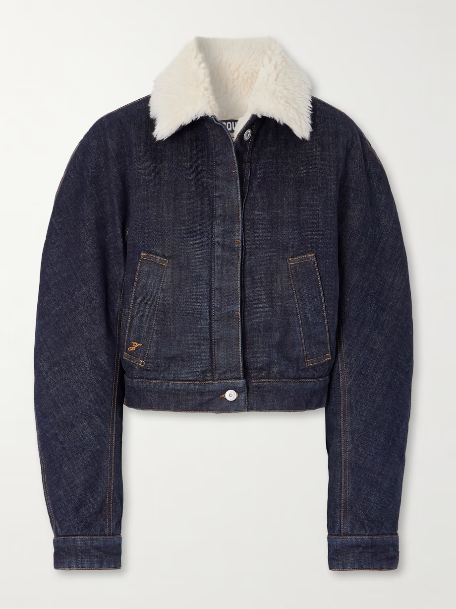 JACQUEMUS The Ovalo fleece-trimmed raw denim jacket