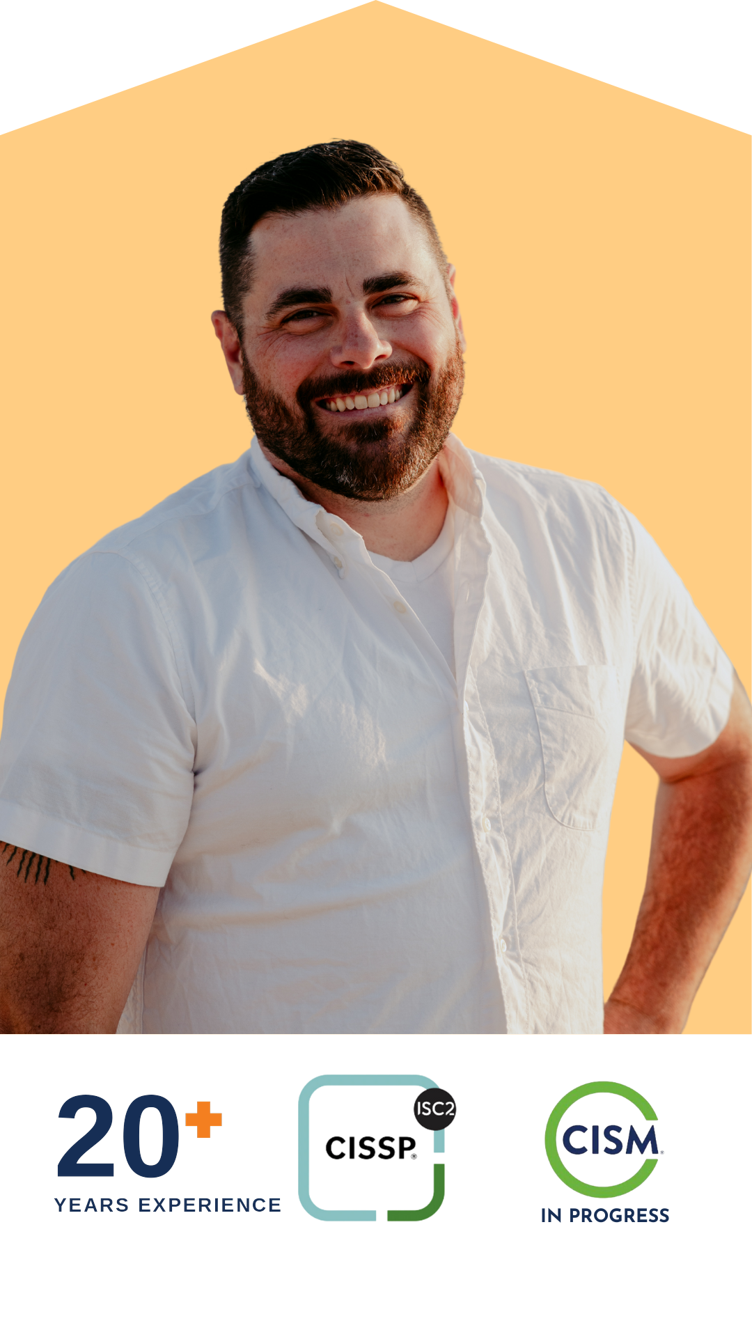 A smiling man with a beard and short dark hair, wearing a white button-up shirt, standing against a background with a peach-colored section and some graphical elements related to cybersecurity certifications.