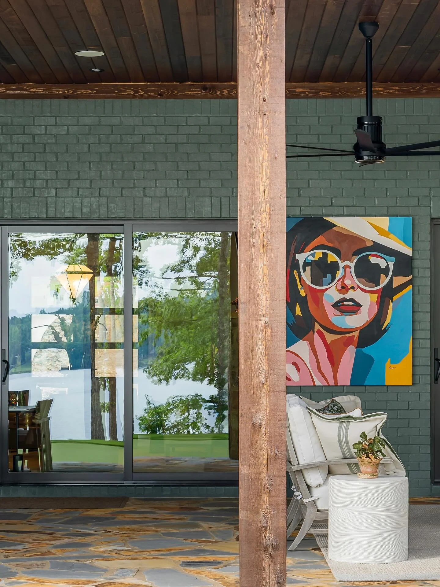 A home is a reflection of the people who live there &amp; I love when a client brings their own eye for beauty. These clients have a love for art and left no room without a meaningful piece - including the porch. 

#design #art #porch #home #interior