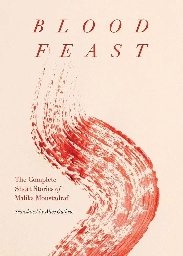 peach backdrop with blood red/rust text that reads in all caps Blood feast, A complete short stories of Malika moustadraf. In black text italics "translated by Alice Guthrie". A red streak of blood curves through the page.