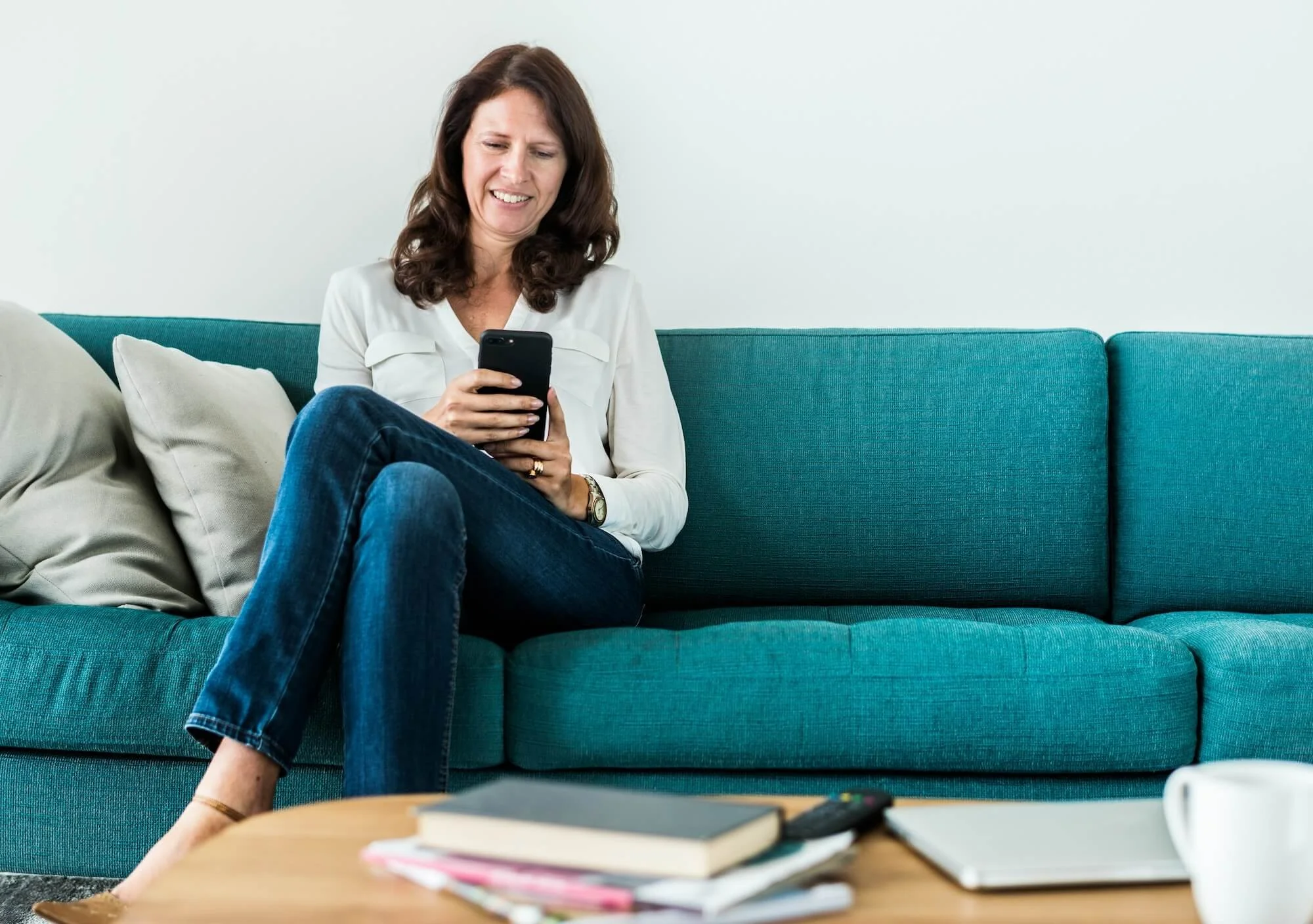 Woman reading the SAFE newsletter