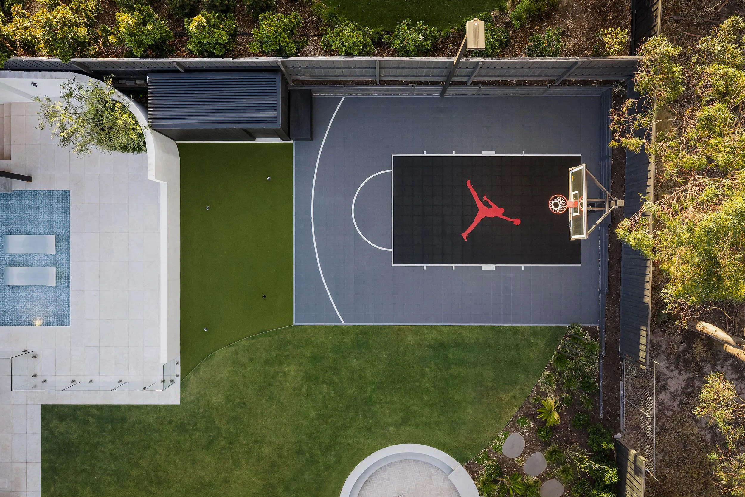 backyard basketball court green surface Doreen