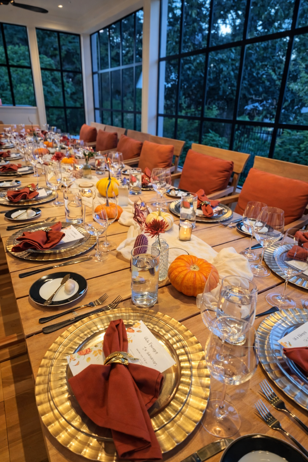 The perfect Autumn dining experience, family forward, brass colors, pumpkins and china beautifully displayed