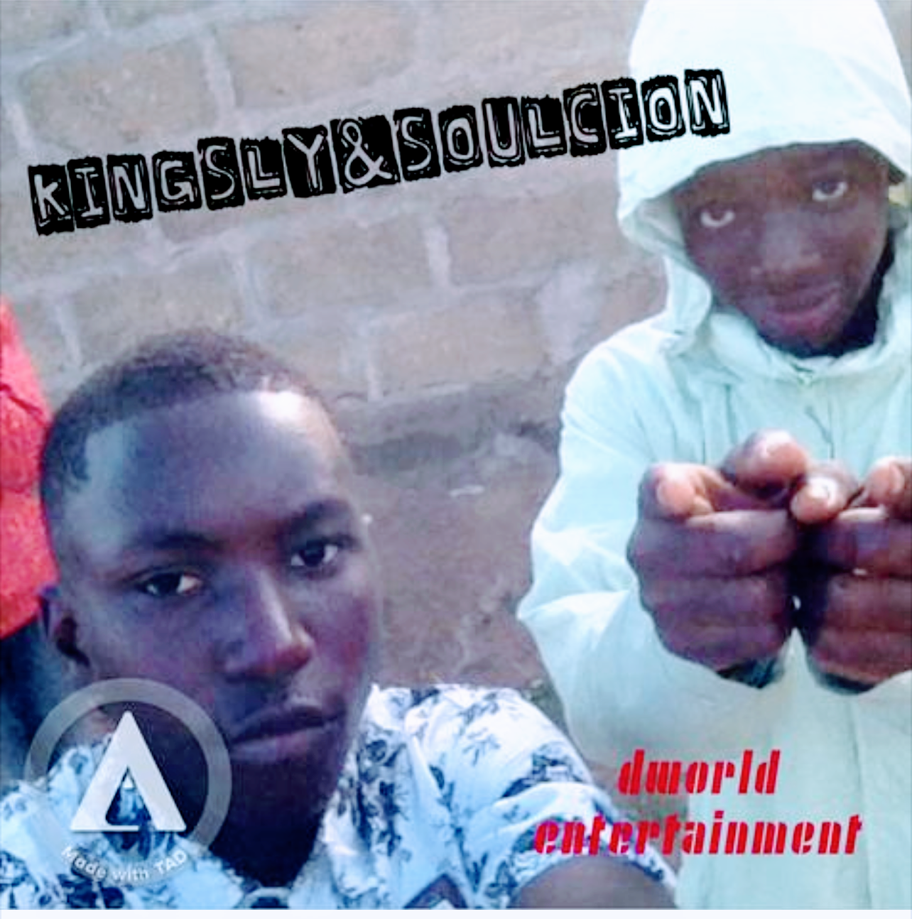 Two young men taking a selfie in front of a brick wall, with one pointing towards the camera. The person on the right is wearing a white hoodie, and the person on the left is wearing a patterned shirt. There is text on the image that reads 'KINGSLY & SOULCION' and 'duorl entertainment'.