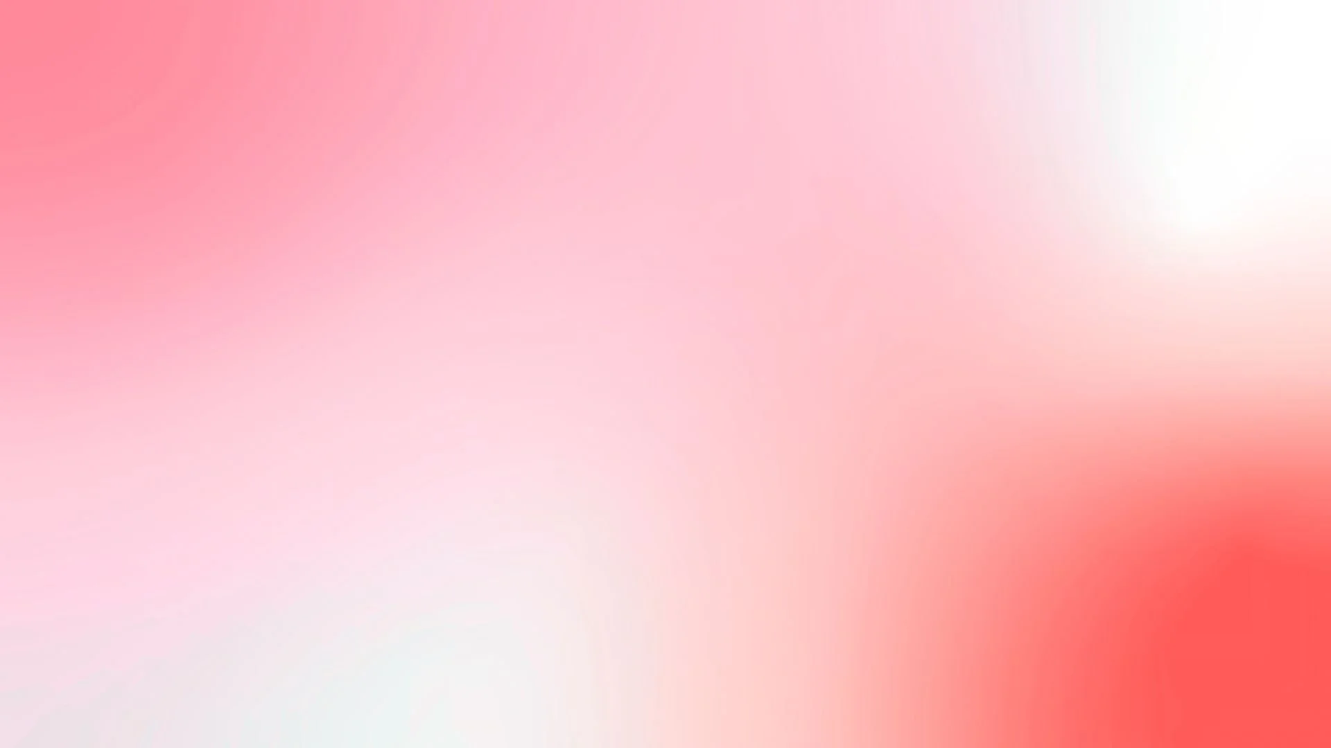 A blurred gradient background with shades of pink, white, and red.