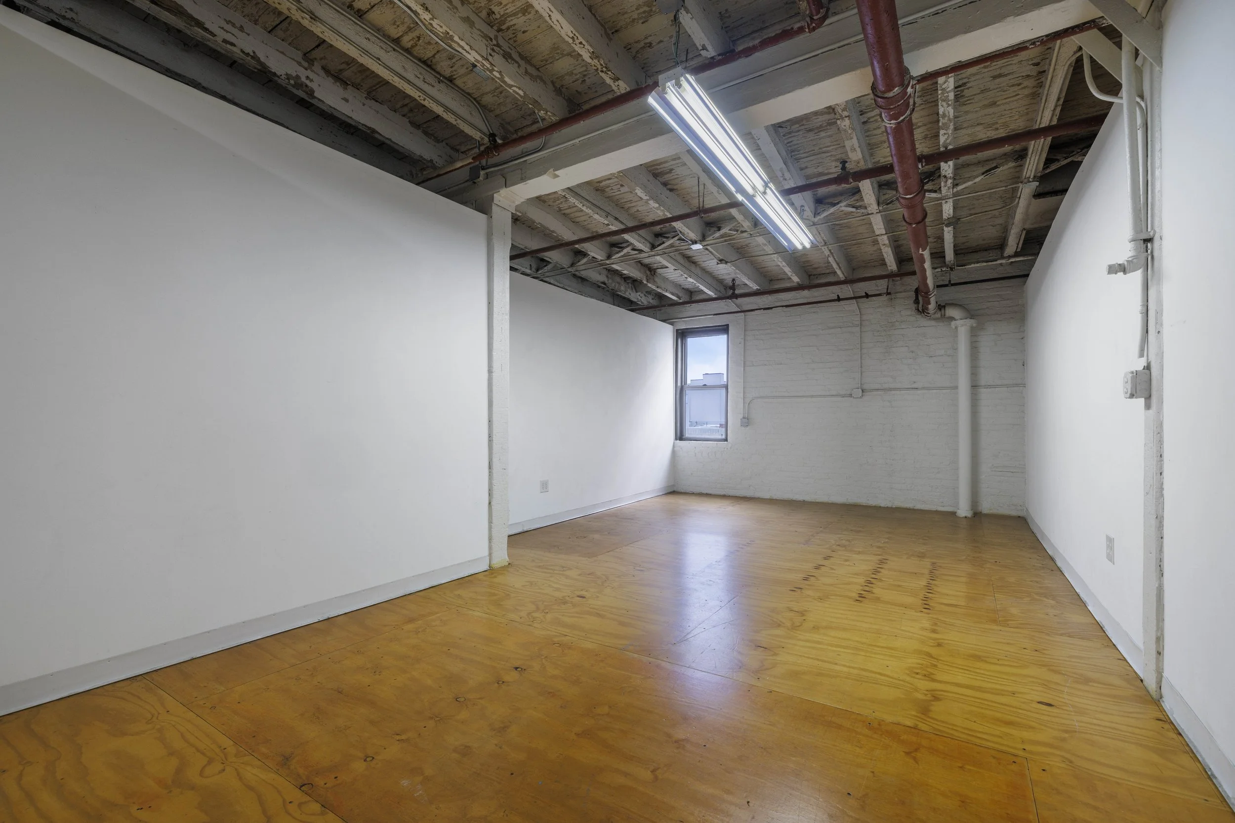 Windowed artist studio with wood floors and exposed ceiling, 93 19th Street, Gowanus, Brooklyn