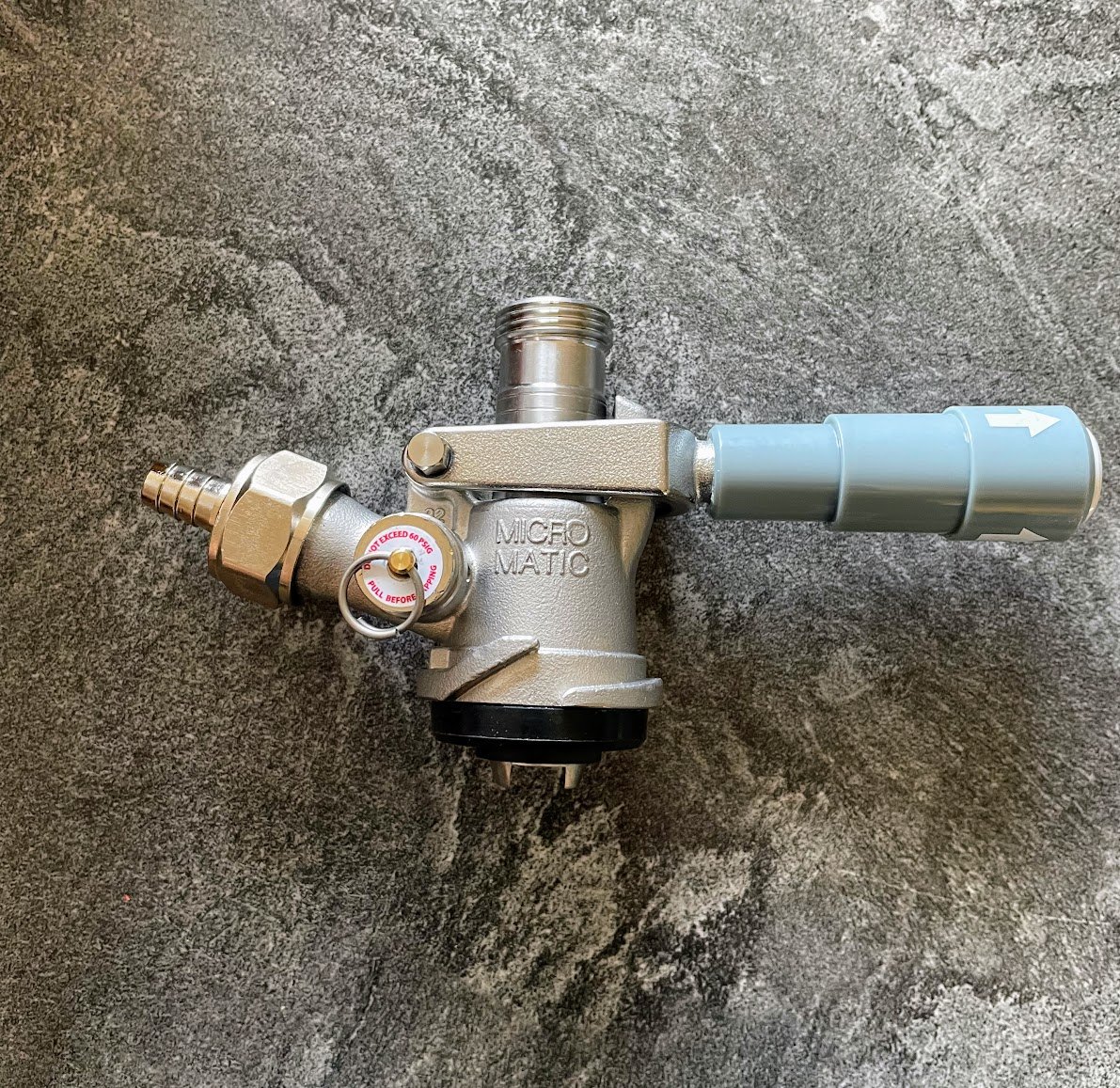 Professional Micro Matic D-system stainless steel keg coupler ready for installation and maintenance by Tapworks Northwest in Skagit or Whatcom County bars