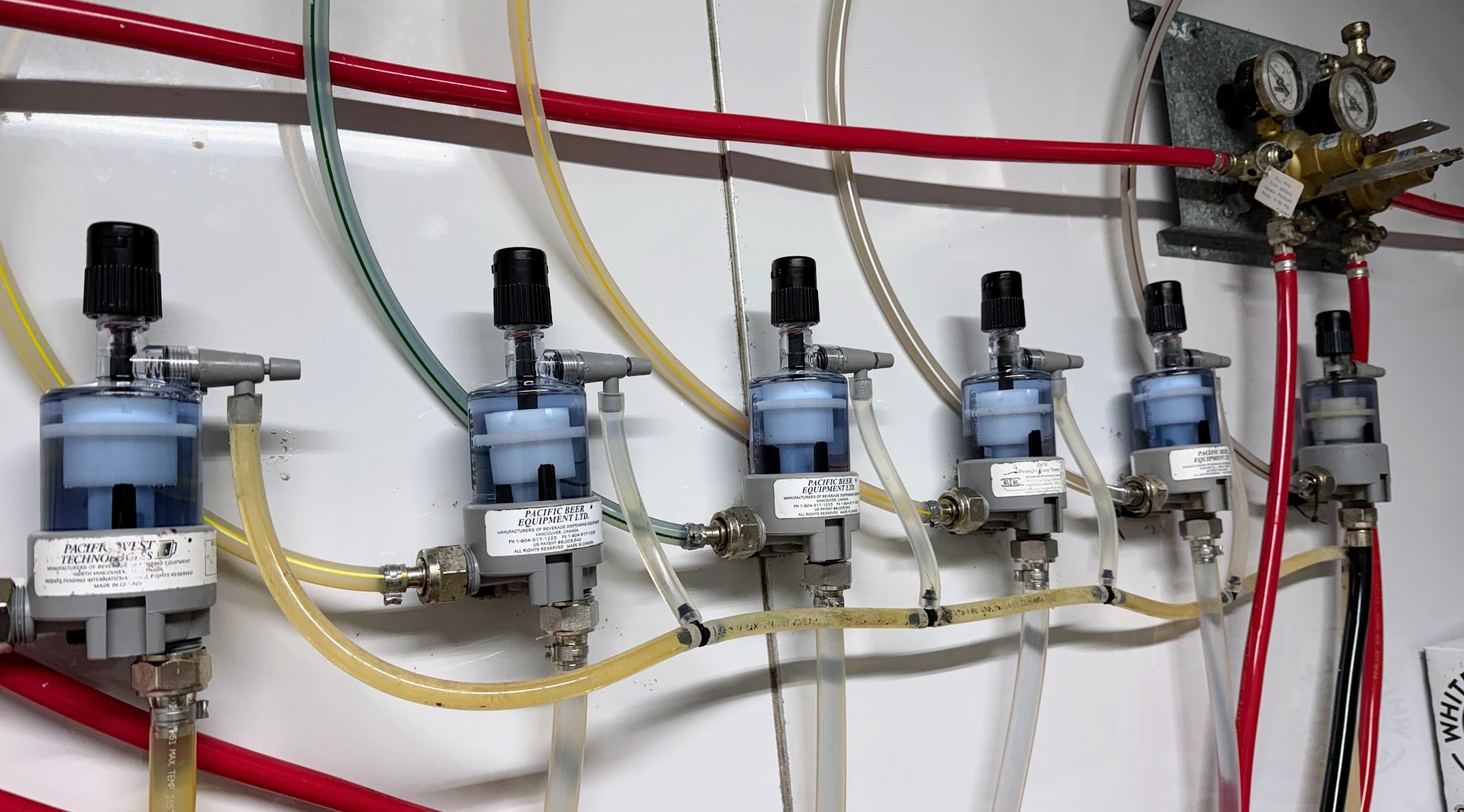 Beer line cleaning solution flowing through FOB detectors in draft system – professional sanitization of foam-on-beer preventers