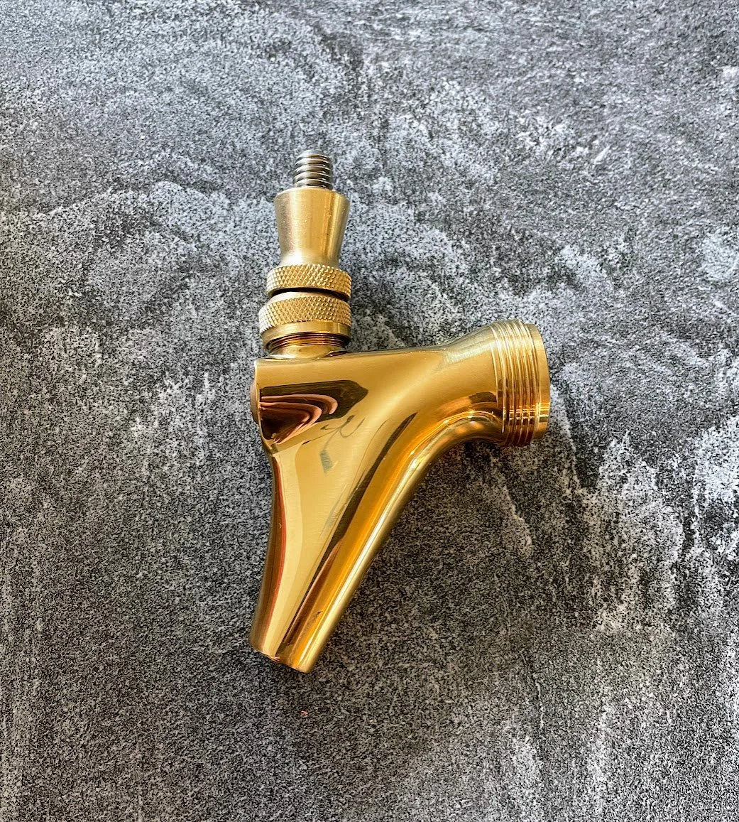 New Micro Matic 304 stainless steel beer tap faucet with polished PVD brass finish, ready for professional installation by Tapworks Northwest at a Northwest Washington bar