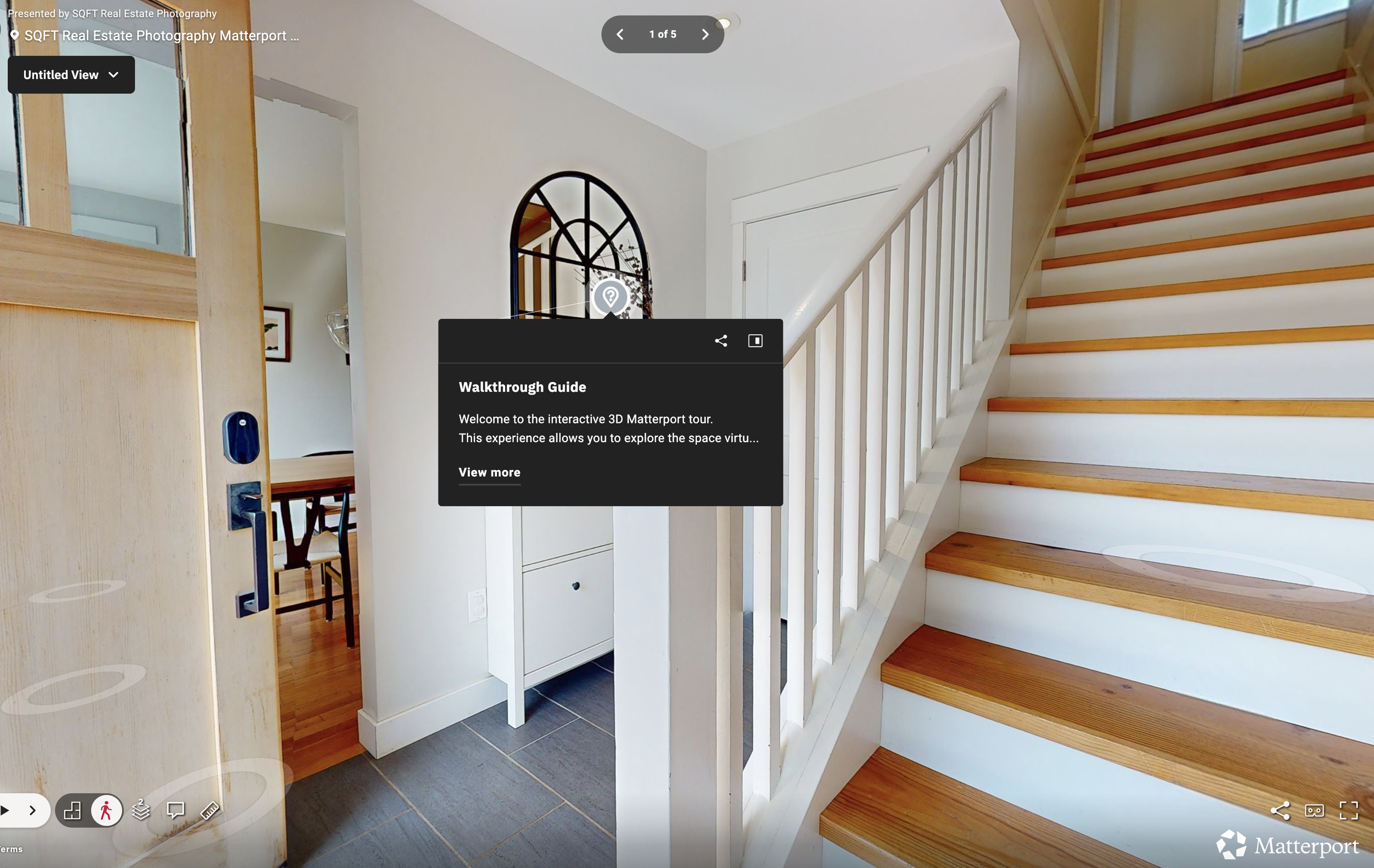 3D dollhouse view of a furnished multi-room interior layout, including a living area, dining room, kitchen, bedrooms, bathrooms, and staircase.
