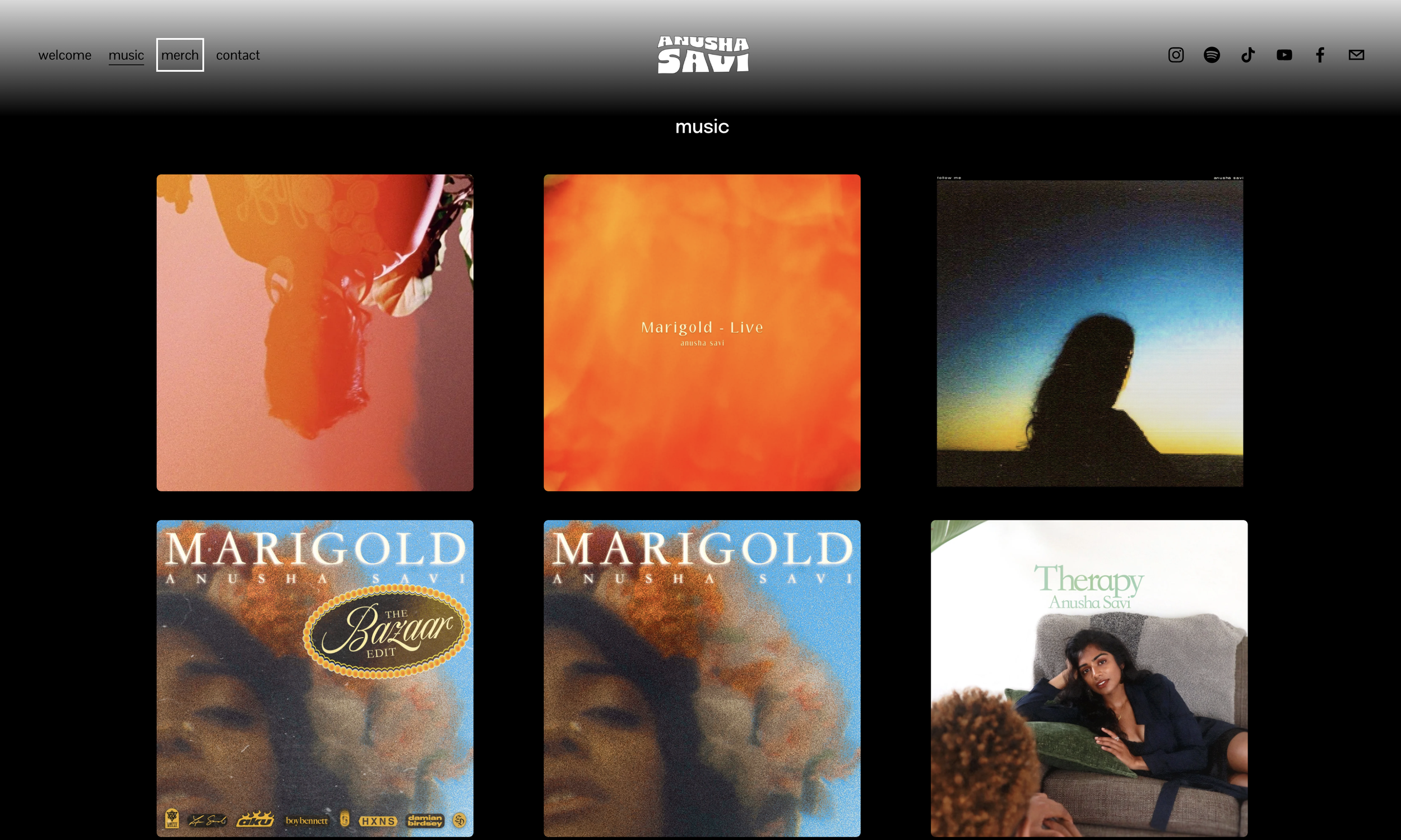 Screenshot of a music website featuring album covers, including 'Marigold - Live' and others by Anusha Savi, with a dark background and social media icons at the top.
