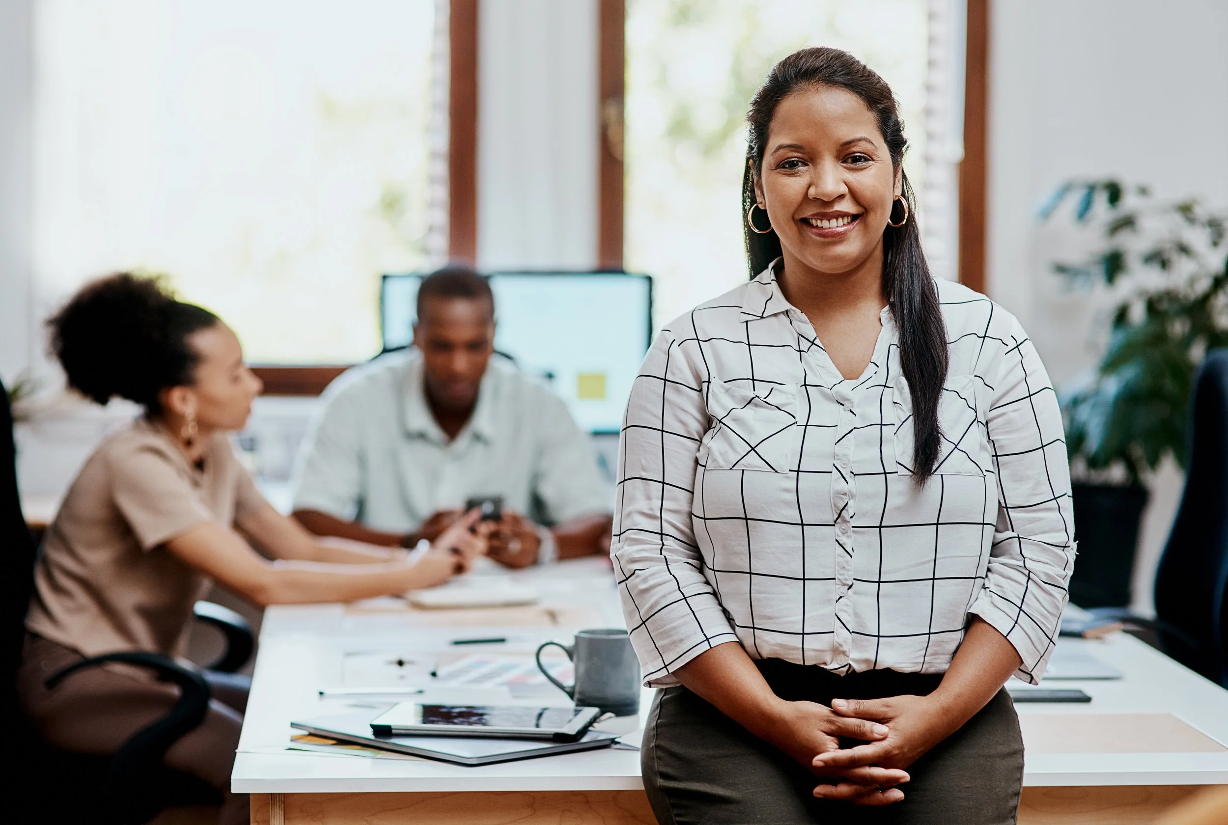 portrait-of-a-confident-young-businesswoman-with-h-2023-11-27-05-08-25-utc.jpg