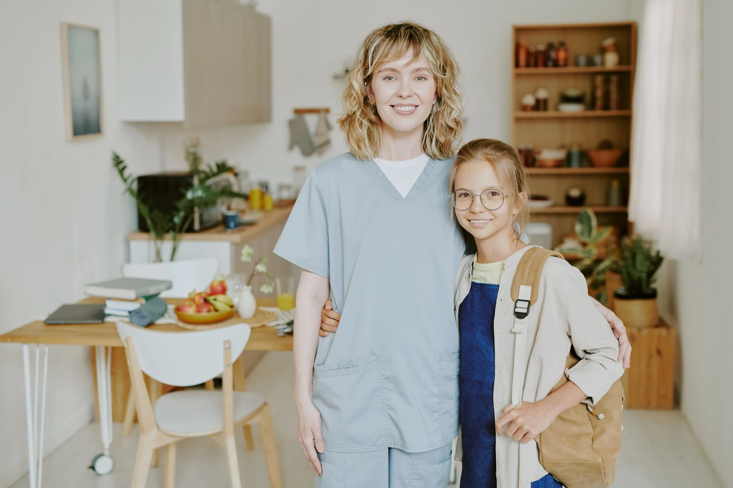 portrait-of-mother-and-daughter-in-kitchen-2024-07-16-01-34-56-utc.jpg