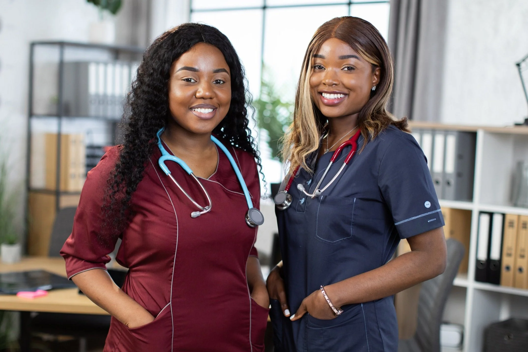 two-female-african-american-doctors-in-colorful-me-2023-11-27-04-56-47-utc.jpg