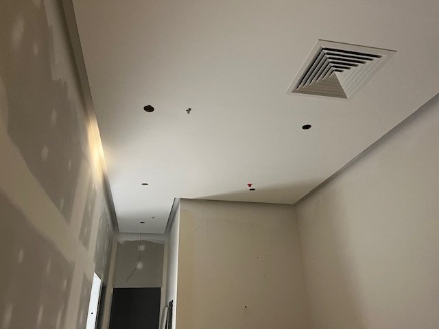 Plaster walls and ceiling