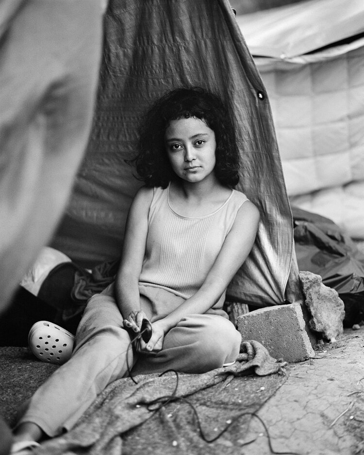 2. Stephany Solano, 17, from Guatemala, at an informal migrant camp in Reynosa, Mexico. Photograph by Stephany Solano and Adam Ferguson.