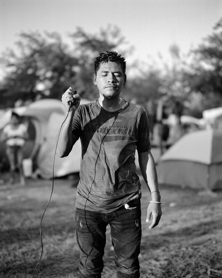 4. Linfir López, 33, from Guatemala, at an informal migrant camp in Reynosa, Mexico. Photograph by Linfir López and Adam Ferguson.