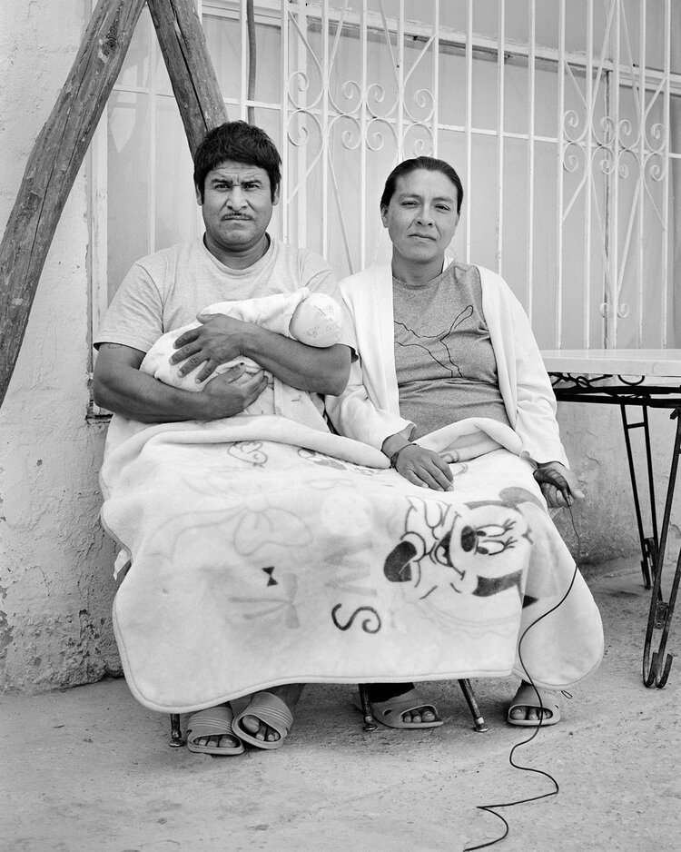 5. Victor Castro, 41, and Gertrudis Ortega, 38, with their 1-month-old daughter, Betani, from Ometepec, Mexico, at the Good Samaritan migrant shelter in Ciudad Juárez. Photograph by Gertrudis Ortega and Adam Ferguson.
