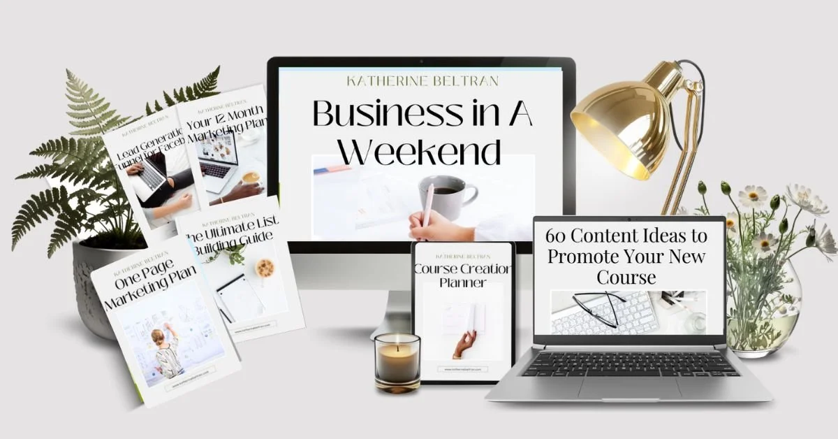 Desk with computer showing “Business in a Weekend” and marketing materials — representing Katherine Beltran’s Your First 100 Clients guide for women entrepreneurs.
