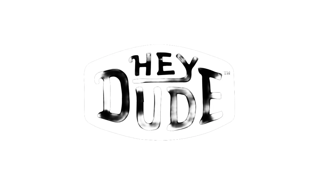 Black background with a white oval containing the text 'HEY DUDE' in bold, stylized black letters.