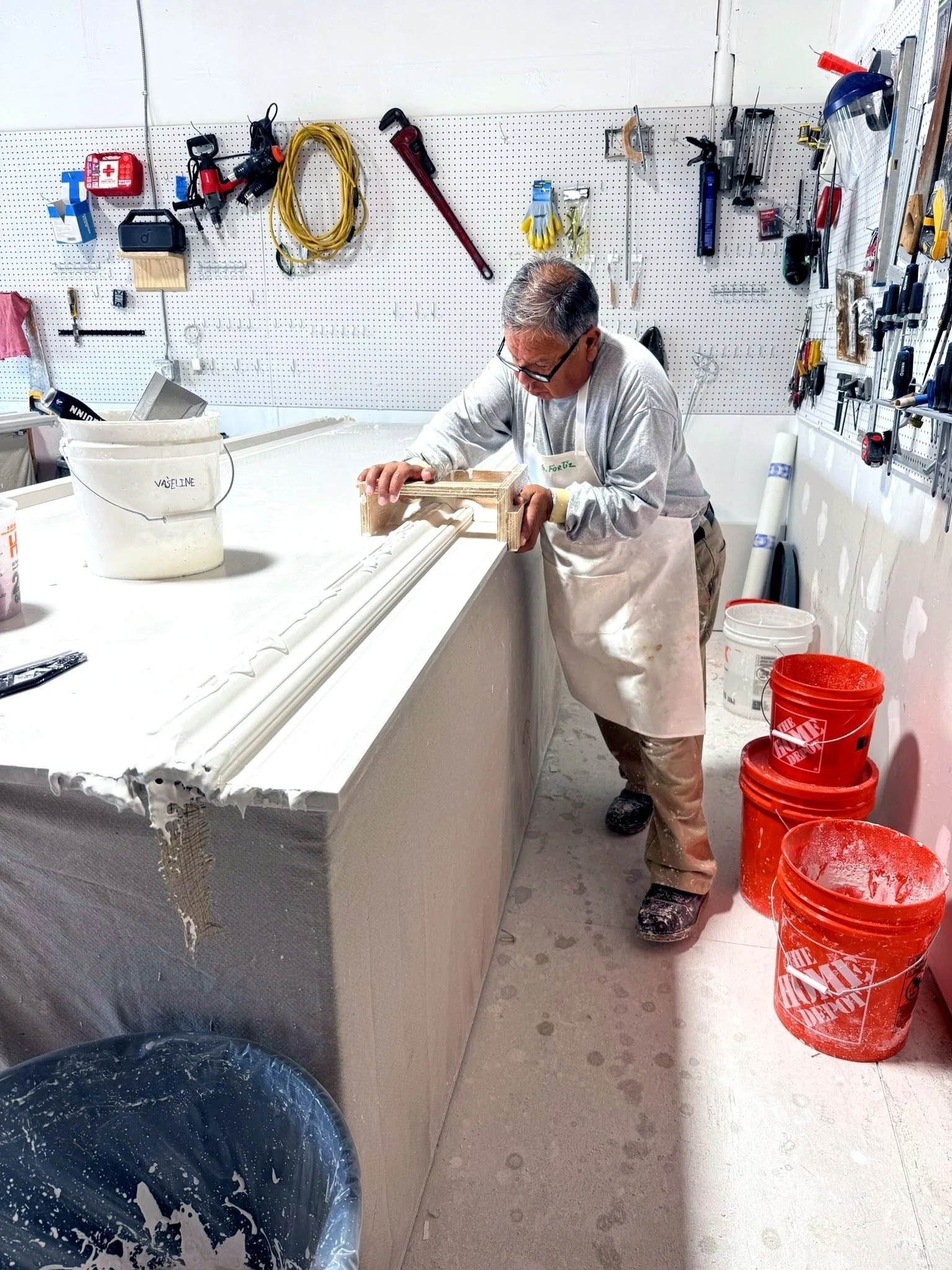 Shaping a cornice with a traditional running mold