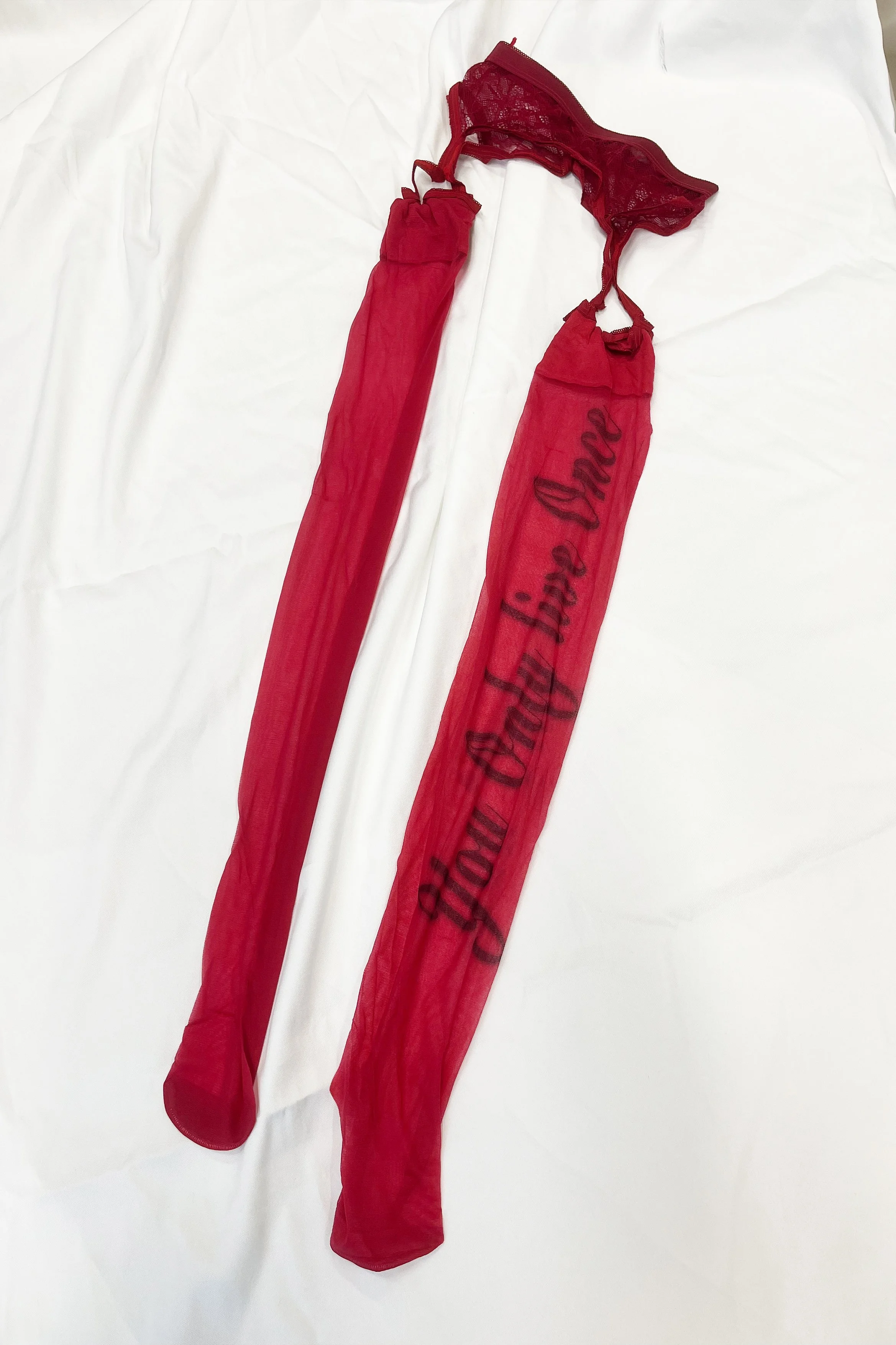 single yolo print on red lingerie stockings