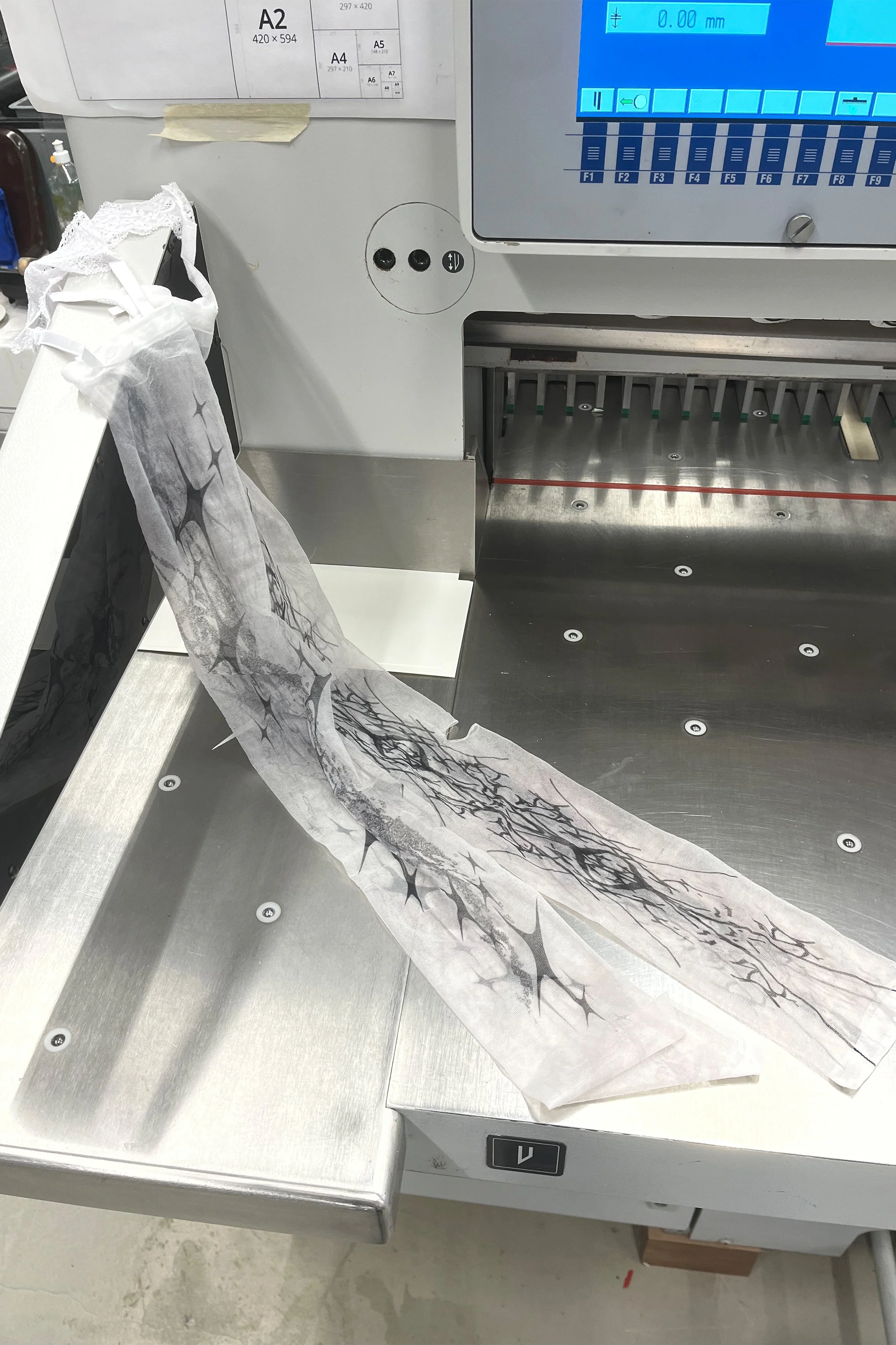 printed black pixelated sparks on over knee stockings with a hole