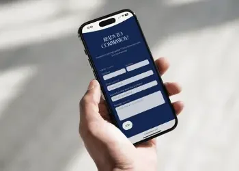 A person holding a smartphone displaying a form titled 'Ready to Connect?'