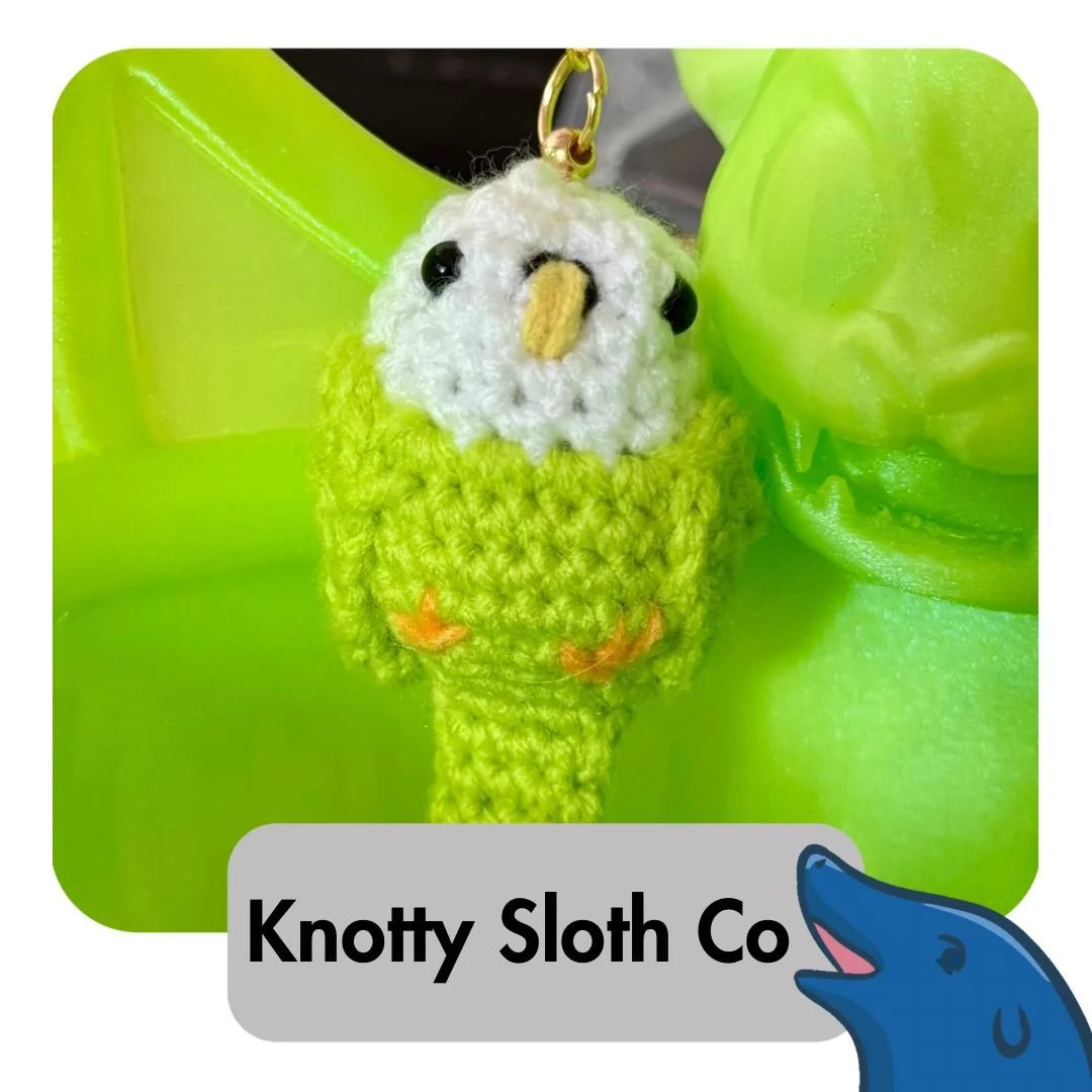 Meet our Scenic Stitches Spectacle vendor:

&ldquo;Hi! I own the Knotty Sloth Co. where I make and sell handmade crochet items ranging between hats and bandanas to clown cats and opossums! I also make shadow boxes!&rdquo; 

Facebook.com/KnottySlothCo