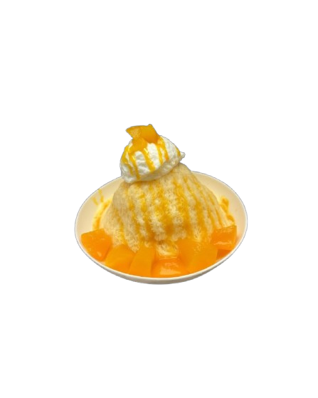 A bowl of mango shaved ice topped with whipped cream and mango pieces.