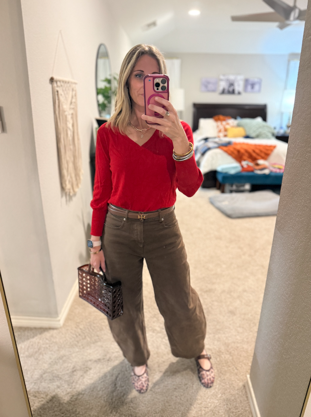 wardrobe stylist barrel jeans jelly purse jelly bag red and brown