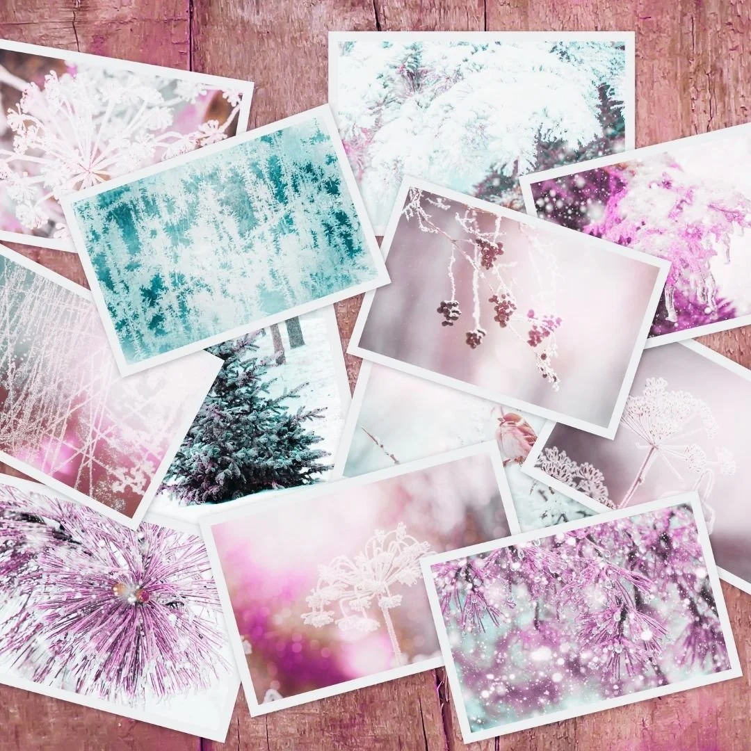 pink and purple photographs scattered on a table