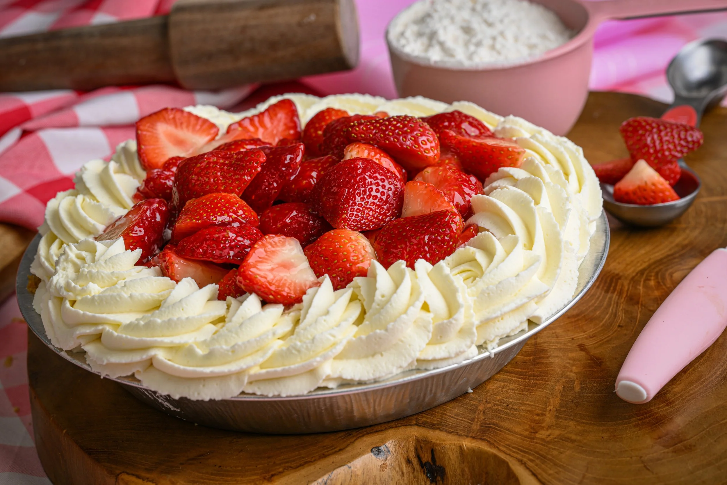 Fresh Strawberry Cheesecake with homemade whipped cream.