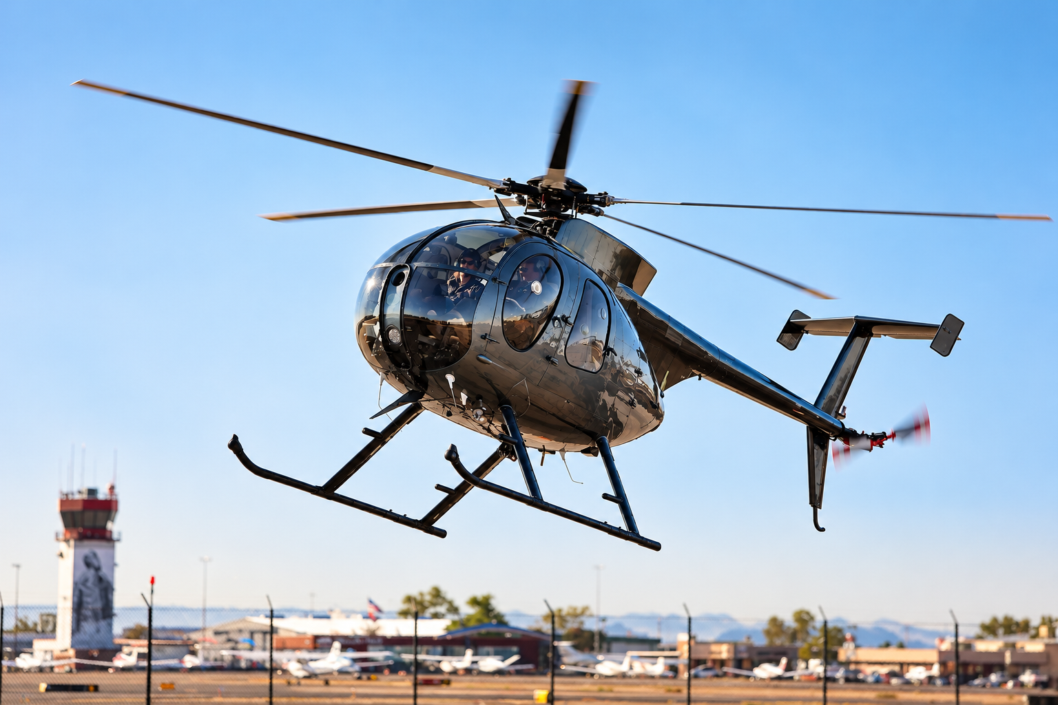 MD 500 single-engine helicopter with distinctive teardrop fuselage, available for private helicopter charter with OdinJets