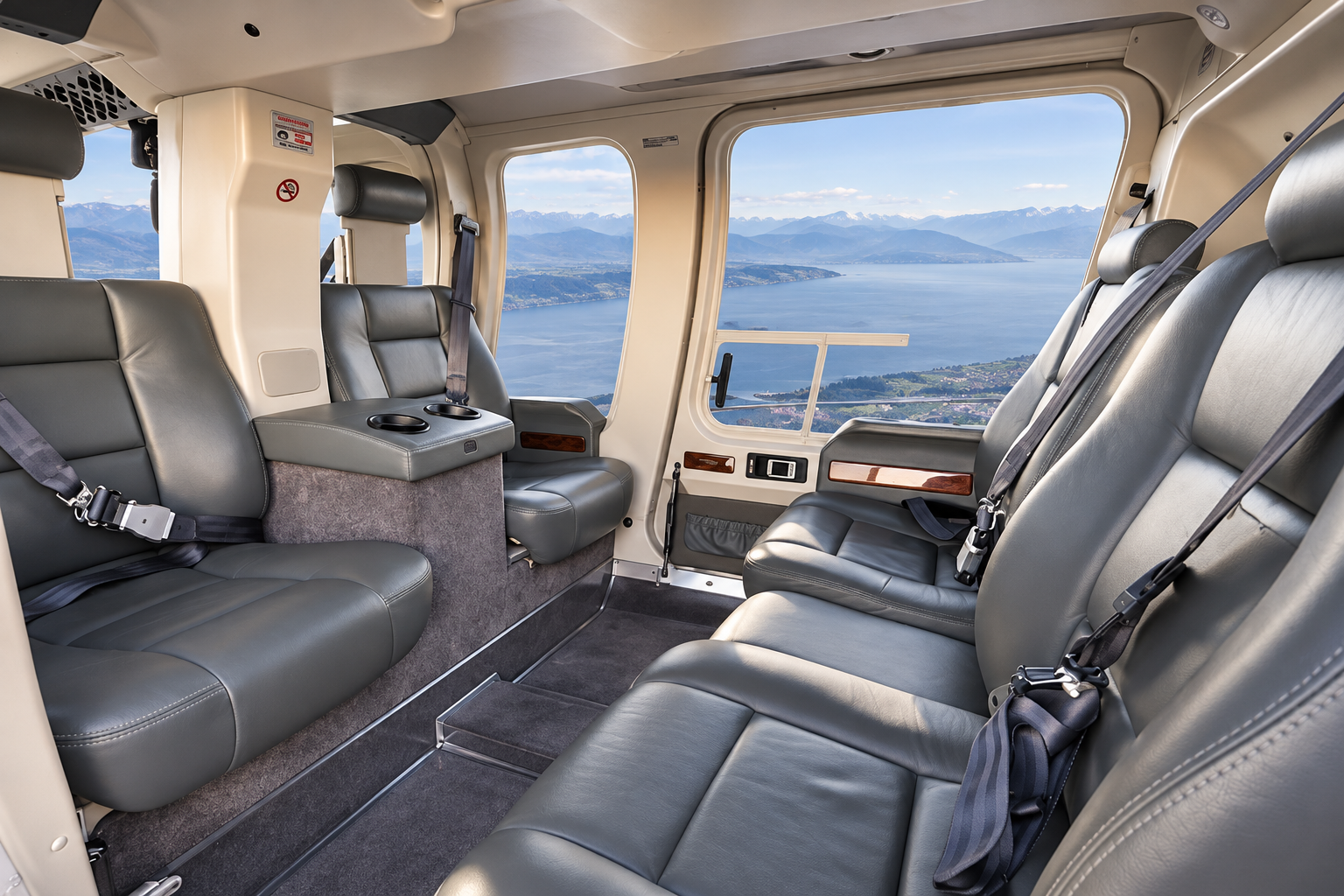 Bell 222 VIP helicopter cabin interior featuring comfortable executive seating for private flights and business transfers.