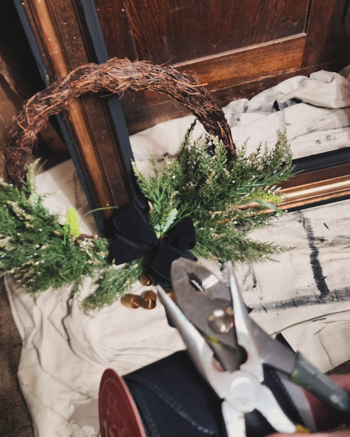 My most recent pet portrait was finished this morning, so this afternoon,  I'm repurposing this frame and wreath for a fun Christmas wall hanging.