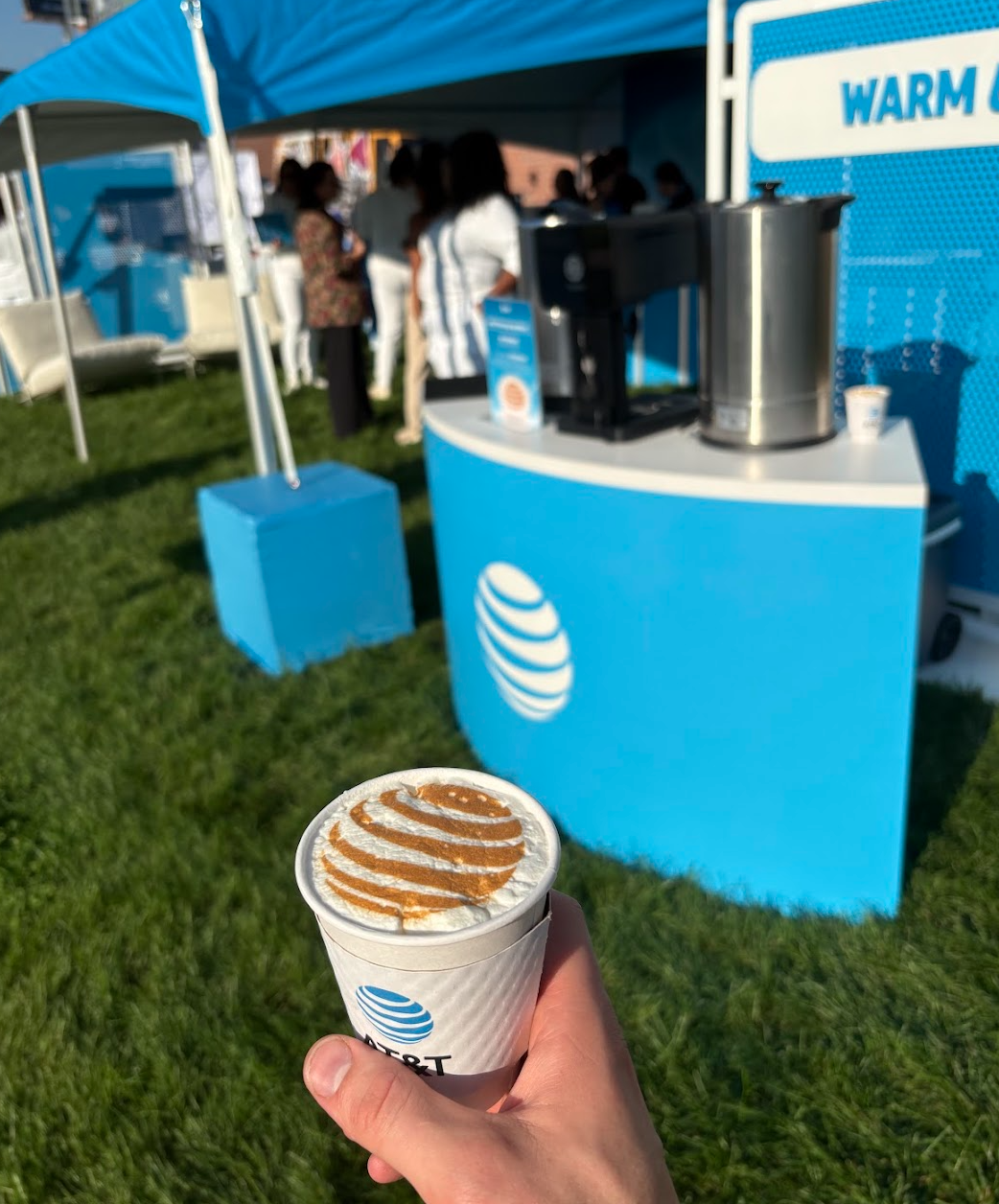 AT&T logo printed on whipped cream topping a hot chocolate in a custom AT&T cup at the Philadelphia region brand activation