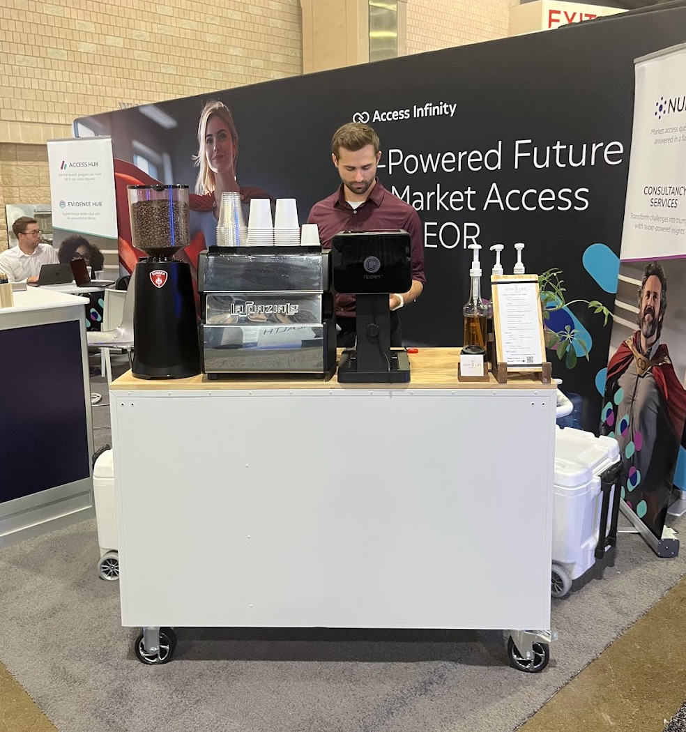 Two coordinated New Life Coffee Company coffee carts at a large event