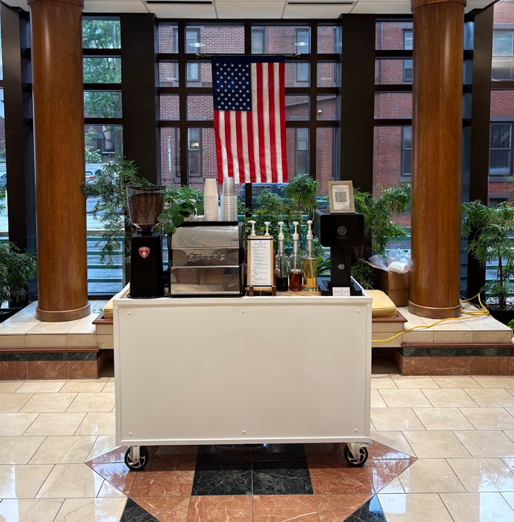 Mobile espresso bar set up in a corporate lobby
