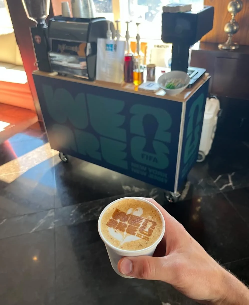 Branded New Life Coffee Company coffee cart serving a FIFA event