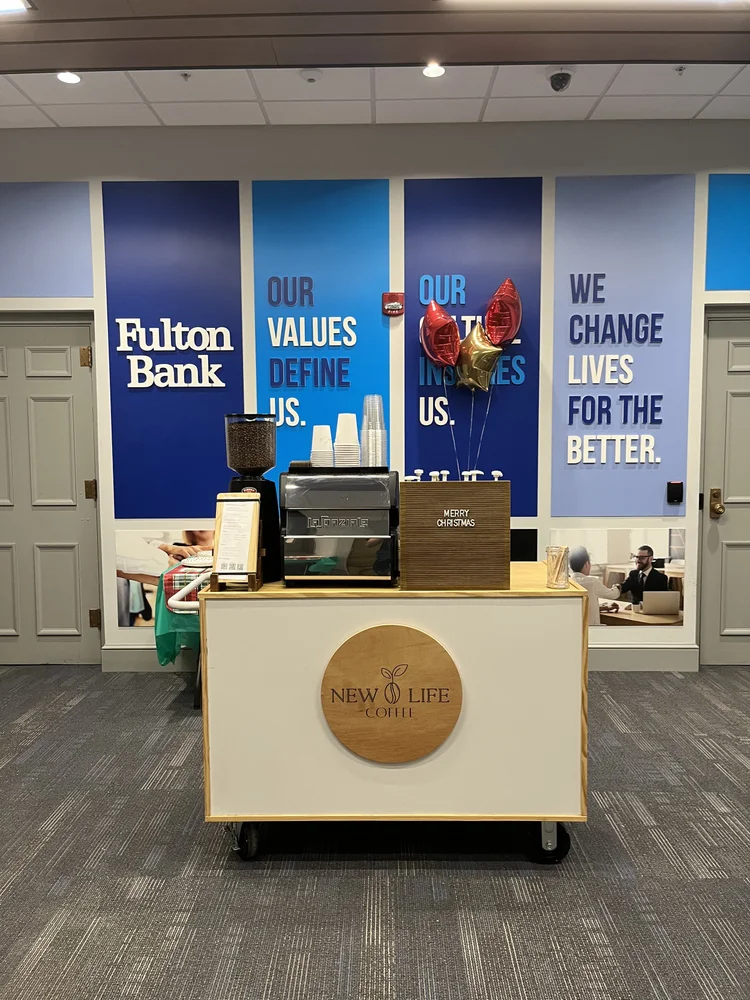 Mobile espresso cart set up at a Fulton Bank event