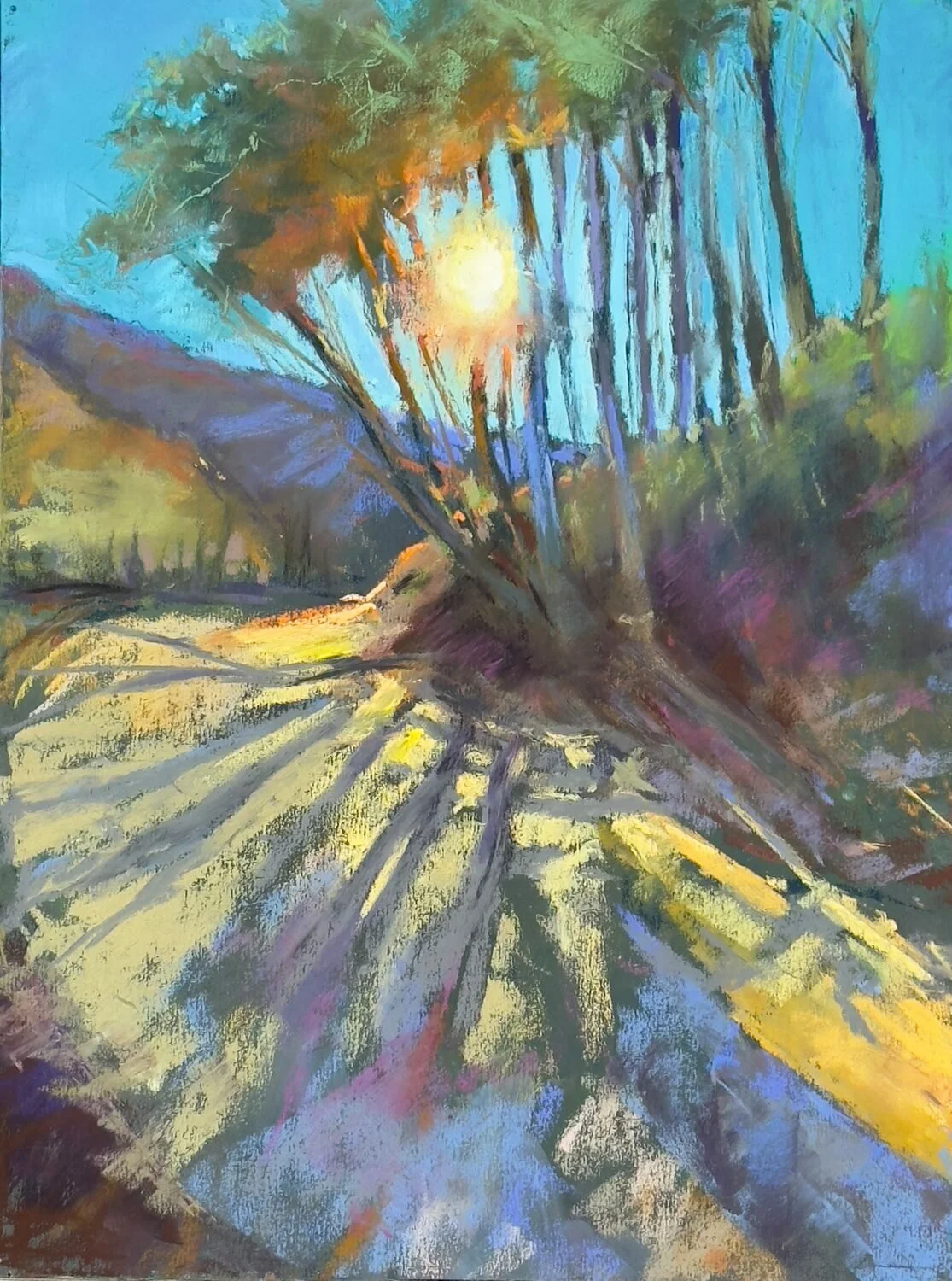 Blick Art Materials Award, Barbara Johnson "Last Light" “The point of radiation from the base of the tree grouping makes a powerful statement in grounding the composition. The sunlight representation is so effective in creating the point of light and