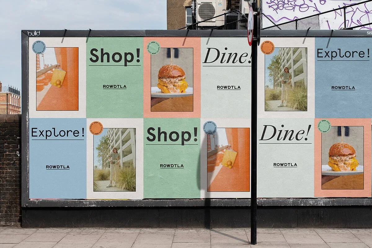 Billboard promoting ROW DTLA, featuring phrases 'Shop!', 'Dine!', and 'Explore!'. Includes images of a burger, shopping bag, and person outside an urban building.