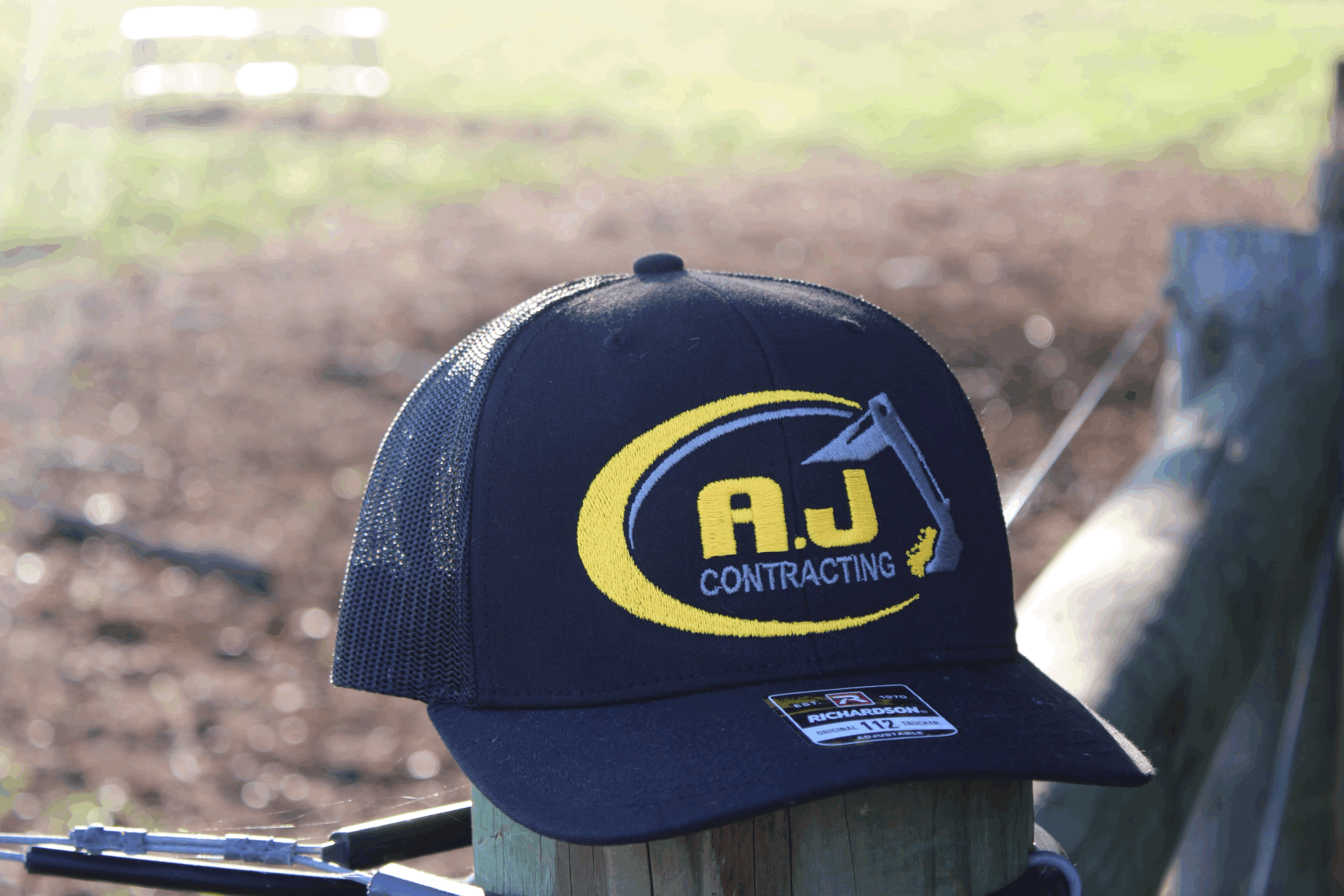 A.J Contracting Trucker Hat