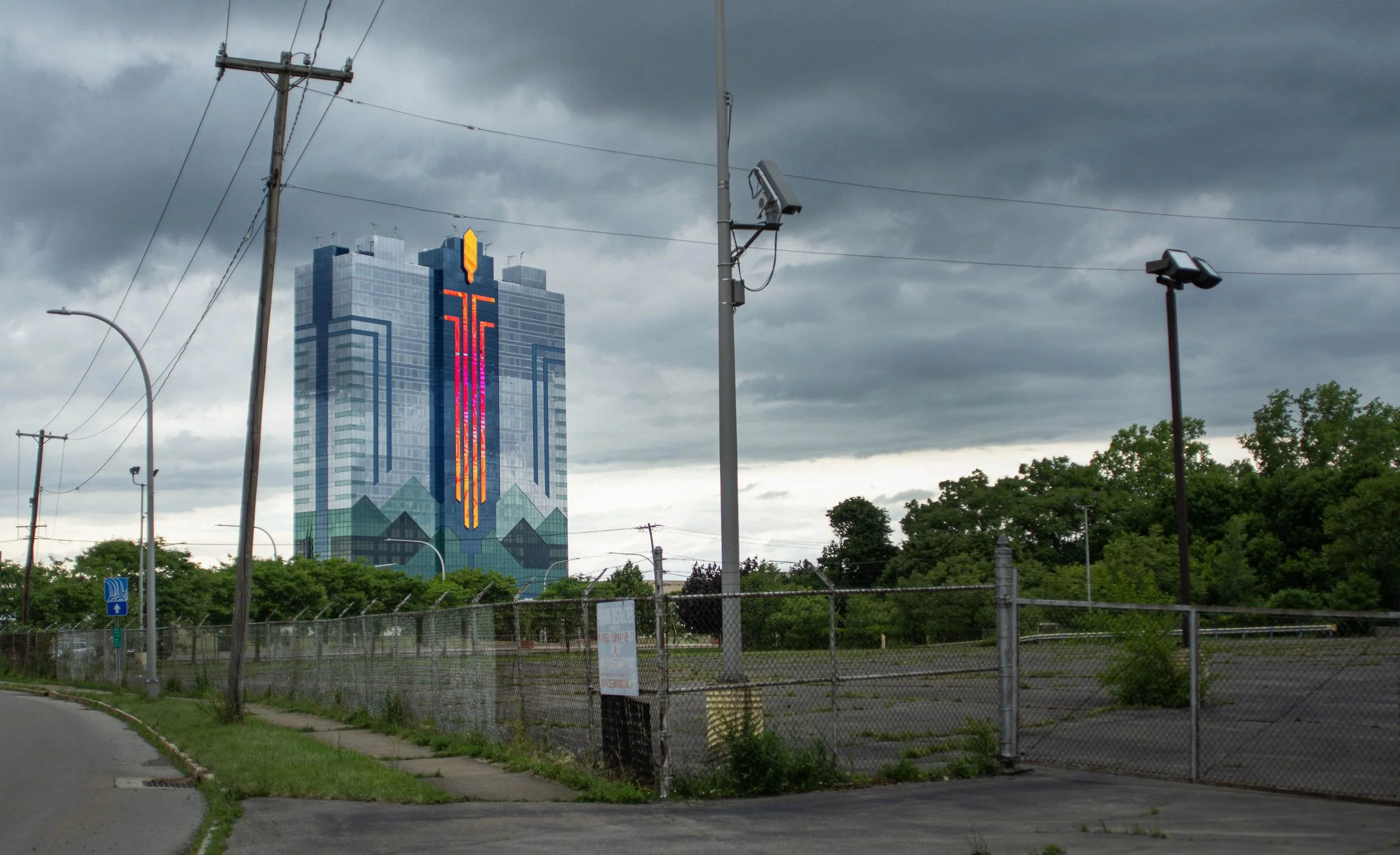 The Seneca Niagara Resort & Casino in Niagara Falls, N.Y. sits lit up against the backdrop of an abandoned factory parking lot. Niagara Falls used to be one of the biggest cities in the United States but now sits rundown due to a decline in manufactu