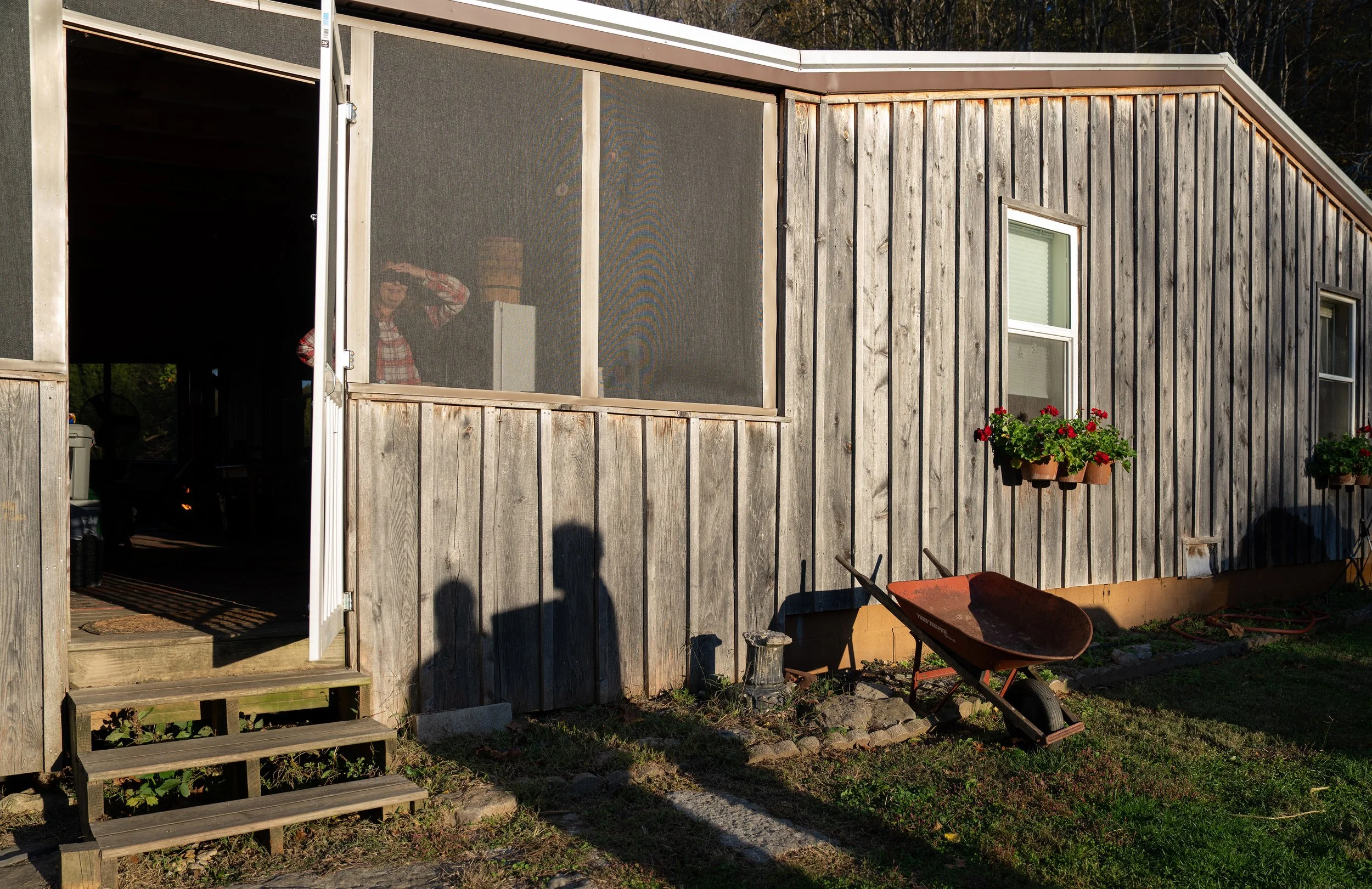 Lauran Hardin waits as friends Babz and Al Nartowicz come over for dinner in Mays Lick, K.Y. on Oct. 23, 2025.
