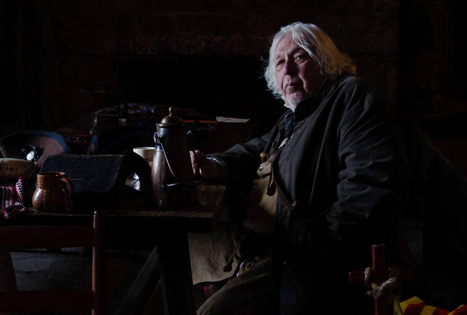 During Soldier's Through the Ages at Old Fort Niagara in Youngstown, N.Y. on May 24, 2026, a reenactor rests in the chapel inside of the French Castle.